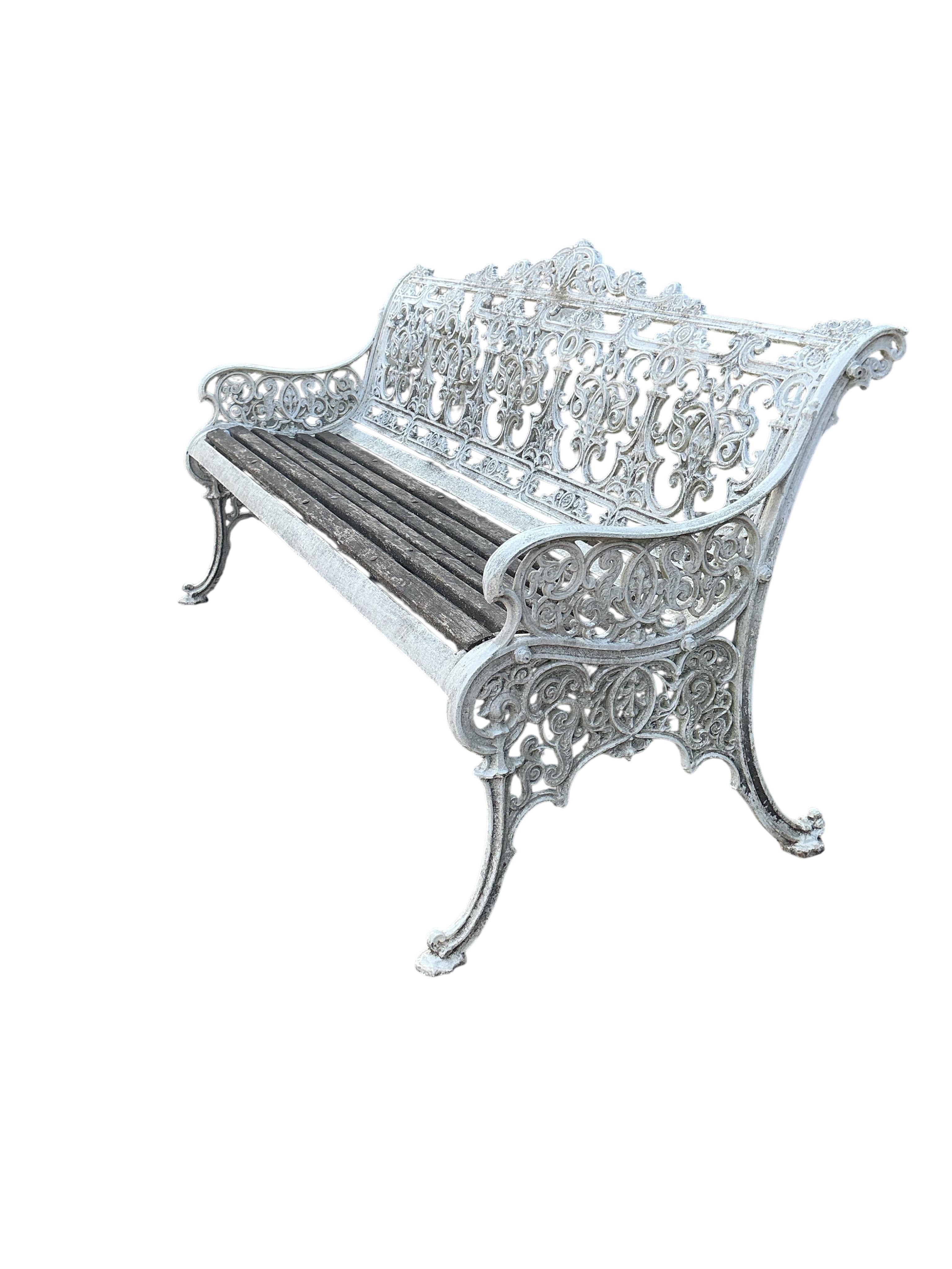 A Victorian Coalbrookdale style cast iron garden bench, width 160cm, depth 68cm, height 90cm